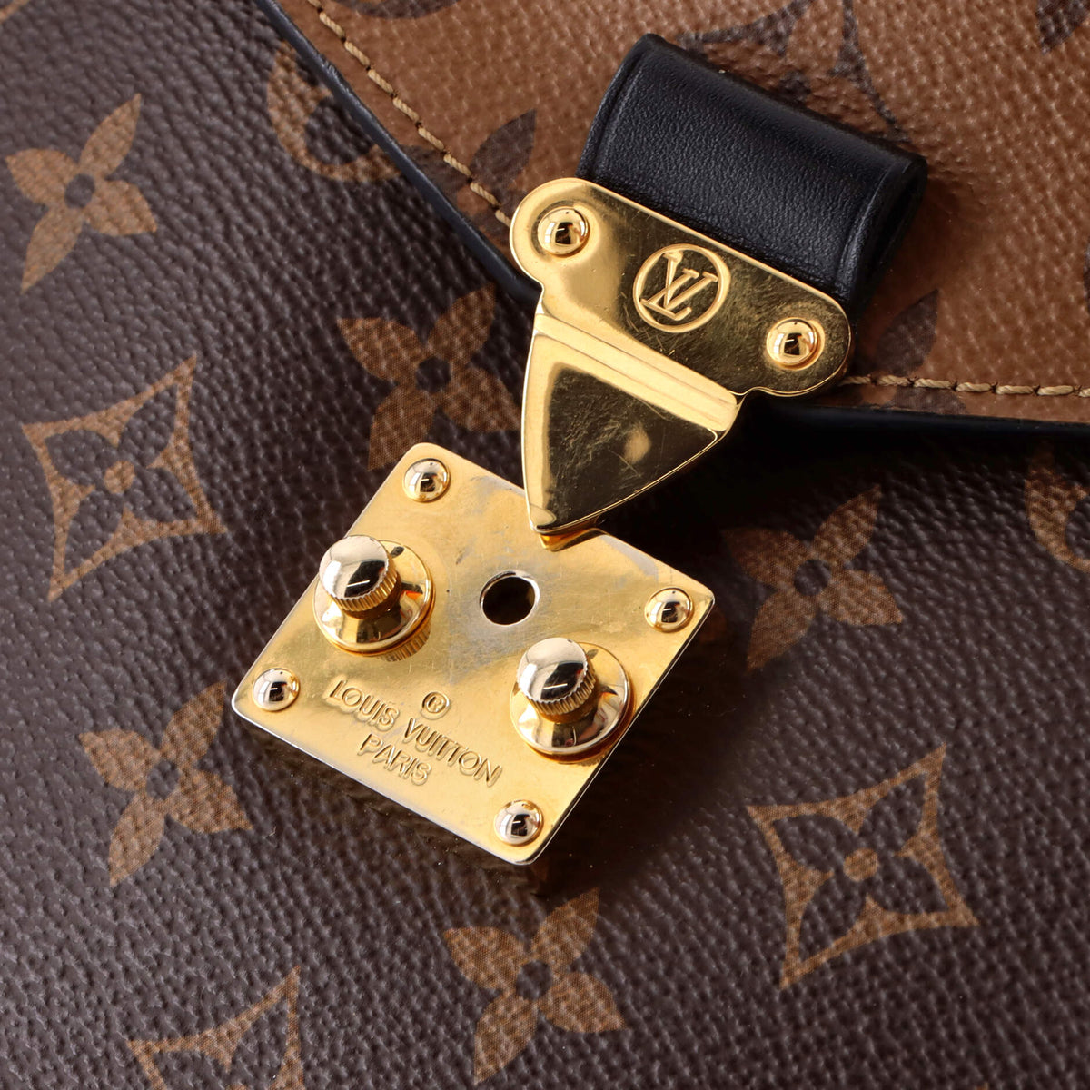 Pochette Metis Reverse Monogram Canvas